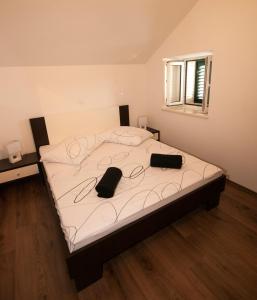 Postel nebo postele na pokoji v ubytování Fokus seaview apartment