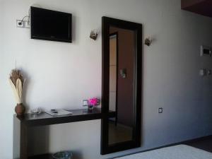 TV a/nebo společenská místnost v ubytování Hotel Kipseli