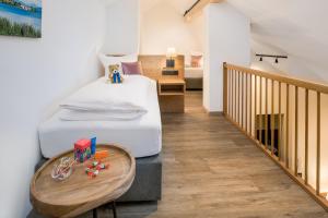 Postel nebo postele na pokoji v ubytování Hotel Obermaier