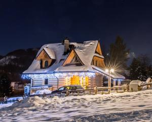Obiekt TatryTop Osada Luxury Chalets Kościelisko zimą