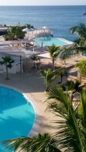 vista para a piscina no hotel de praia ou nas proximidades em Private Apartments in Caribe Dominicus solo adultos em Bayahibe