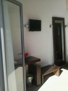 TV a/nebo společenská místnost v ubytování Hotel Kipseli