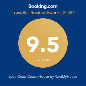 a yellow circle with the number nine and the text travelling review awards at Lyde Cross Coach House in Hereford