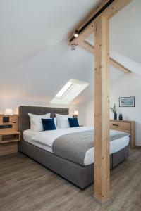 Postel nebo postele na pokoji v ubytování Hotel Obermaier