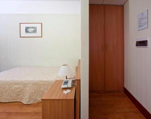 Voodi või voodid majutusasutuse Hotel Fortuna toas