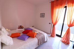 A bed or beds in a room at Giò Otranto holiday home for 6 people