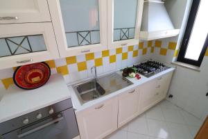 A kitchen or kitchenette at Giò Otranto holiday home for 6 people