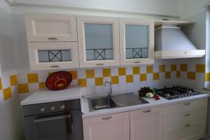 A kitchen or kitchenette at Giò Otranto holiday home for 6 people