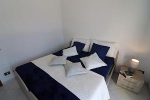 A bed or beds in a room at Giò Otranto holiday home for 6 people