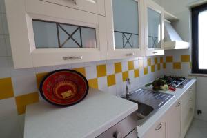 A kitchen or kitchenette at Giò Otranto holiday home for 6 people