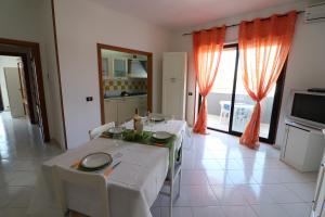 A television and/or entertainment centre at Giò Otranto holiday home for 6 people