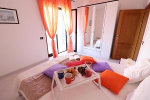 A bed or beds in a room at Giò Otranto holiday home for 6 people