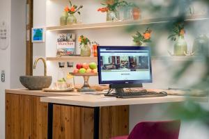 TV a/nebo společenská místnost v ubytování Hotel Obermaier
