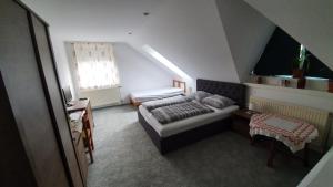 Postel nebo postele na pokoji v ubytování Veszprém Room