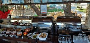 a buffet of food on a table in at Irides in Souvala