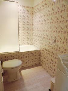 a bathroom with a toilet and a sink at #PACAGROOM# Studio Alexandre III in Cannes