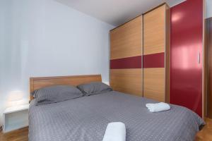 Postel nebo postele na pokoji v ubytování Apartment Roberto Punta