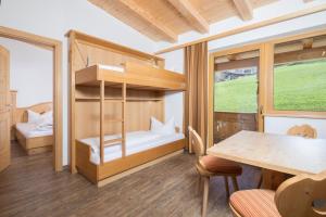 Postel nebo postele na pokoji v ubytování Hotel & Alpengasthof Pinzgerhof