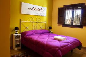 Posteľ alebo postele v izbe v ubytovaní Puerta Bubión Apartamentos