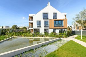Vonkajšia záhrada v ubytovaní Flamingo Beach Apartment