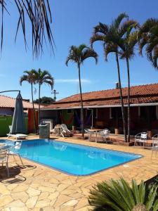 Swimmingpoolen hos eller tæt på Pousada Jacare Pepira