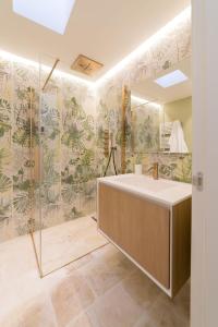 Ett badrum på Trulli Resort Aia Piccola