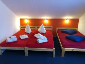 Postel nebo postele na pokoji v ubytování Beachside Guest House Strautini