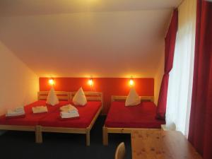 Postel nebo postele na pokoji v ubytování Beachside Guest House Strautini