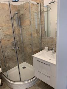 Ένα μπάνιο στο Apartament Walczaka 11 MIEJSCE PARKINGOWE