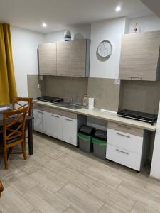 Kuchyň nebo kuchyňský kout v ubytování Villa Rustica