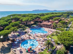 an aerial view of a pool at a resort at Sea View Home -Bilocale Angolo Cottura Vista Mare 4 pax in Albinia