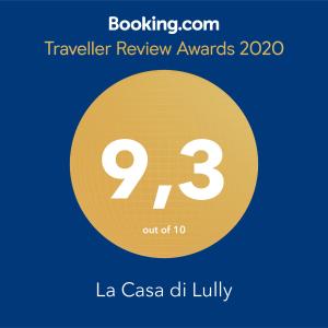 a yellow circle with the number nine and the text travelling review awards at La Casa di Lully in Torre del Greco