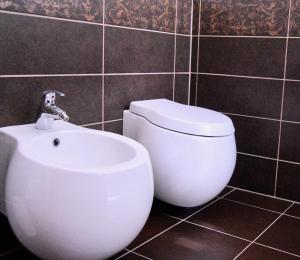 Koupelna v ubytování Brilant Antik Hotel