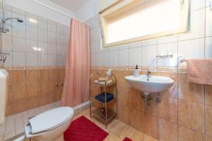 Koupelna v ubytování Apartments Pilicari + 37 fotografií