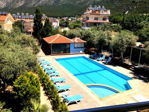 Bazén v ubytování Nature Hotel Doğa Hotel Ölüdeniz nebo v jeho okolí