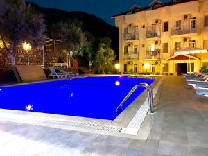 Bazén v ubytování Nature Hotel Doğa Hotel Ölüdeniz nebo v jeho okolí