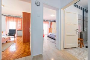 Postel nebo postele na pokoji v ubytování Apartments Pilicari