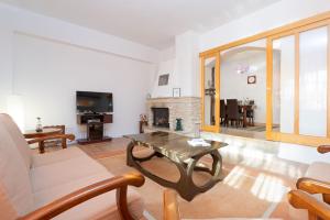 TV a/nebo společenská místnost v ubytování Apartments Pilicari