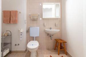Koupelna v ubytování Apartments Pilicari