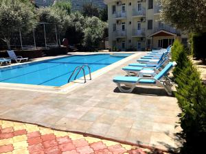 Bazén v ubytování Nature Hotel Doğa Hotel Ölüdeniz nebo v jeho okolí