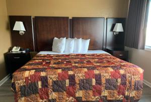 Ein Bett oder Betten in einem Zimmer der Unterkunft Sea Horse Inn and Cottages