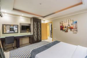 Letto o letti in una camera di Al Muhaidb Residence Al Khobar