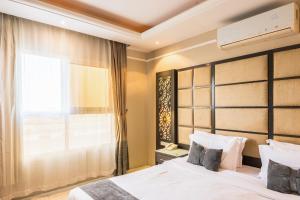 Letto o letti in una camera di Al Muhaidb Residence Al Khobar
