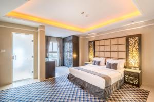 Letto o letti in una camera di Al Muhaidb Residence Al Khobar