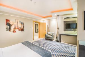 Letto o letti in una camera di Al Muhaidb Residence Al Khobar