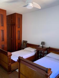 מיטה או מיטות בחדר ב-Casa em Águas de Lindóia!