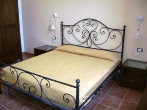 Un pat sau paturi într-o cameră la Fiumara Del Sossio