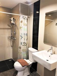 Koupelna v ubytování Izen Plus Budget Hotel & Residence + 25 fotografií