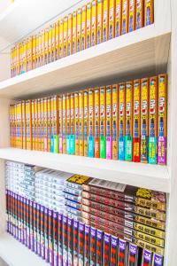 a shelf of childrens books in a store at AMP FLAT Itoshima in Fukuoka