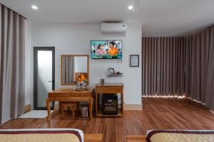 TV/trung tâm giải trí tại Villa Caribe